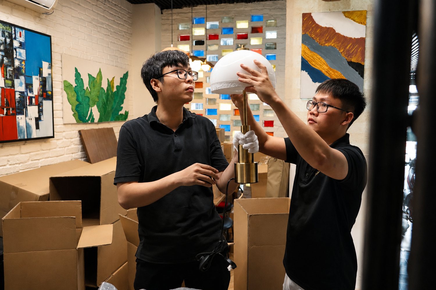 Inspecting a Hilykan luminaire before delivery